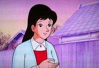 珍しくカーデガン姿の明子