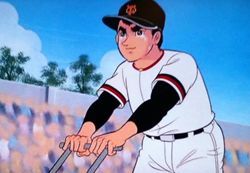 うれし涙を流しながら白線を引く飛雄馬