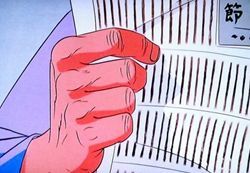 一徹の新聞をもつ手がふるえる