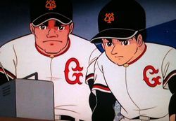 ベンチでテレビを見る飛雄馬