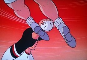 タッチしようとした一塁手の頭の上を飛び越える